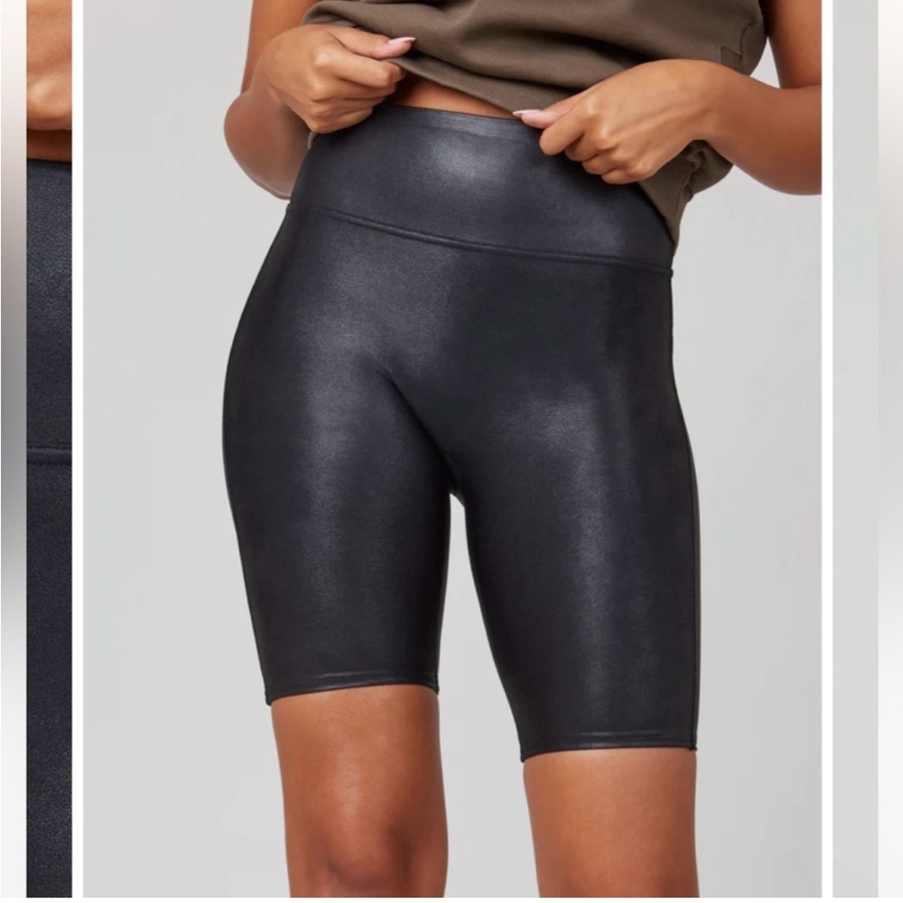 Women’s Spanx faux leather black bike shorts. Small
